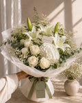Pureté all white flower bouquet lilies roses hydrangea Bahrain - Bourgéon