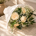 Soie peach rose hand bouquet Bahrain - Bourgéon luxury flowers